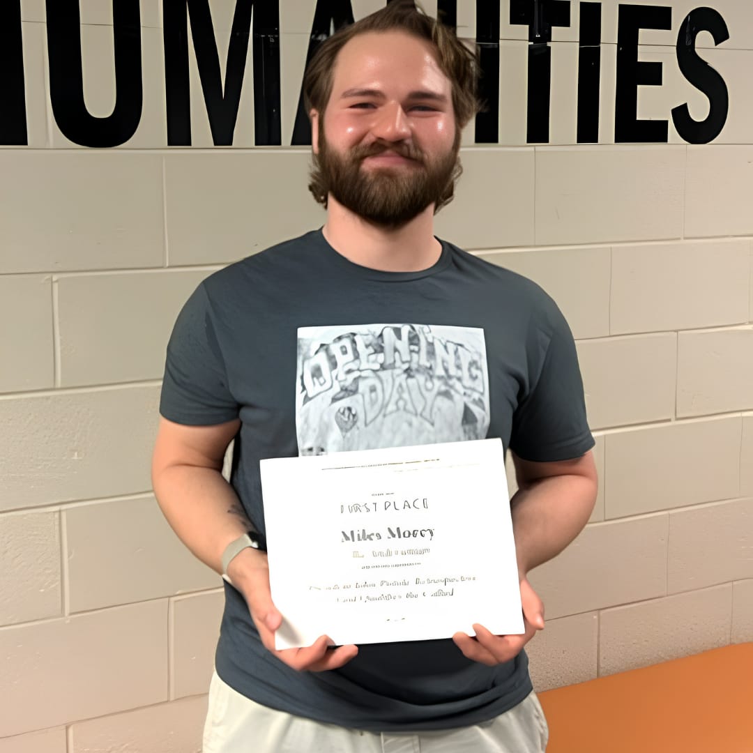 Student Miles Morey with first place award