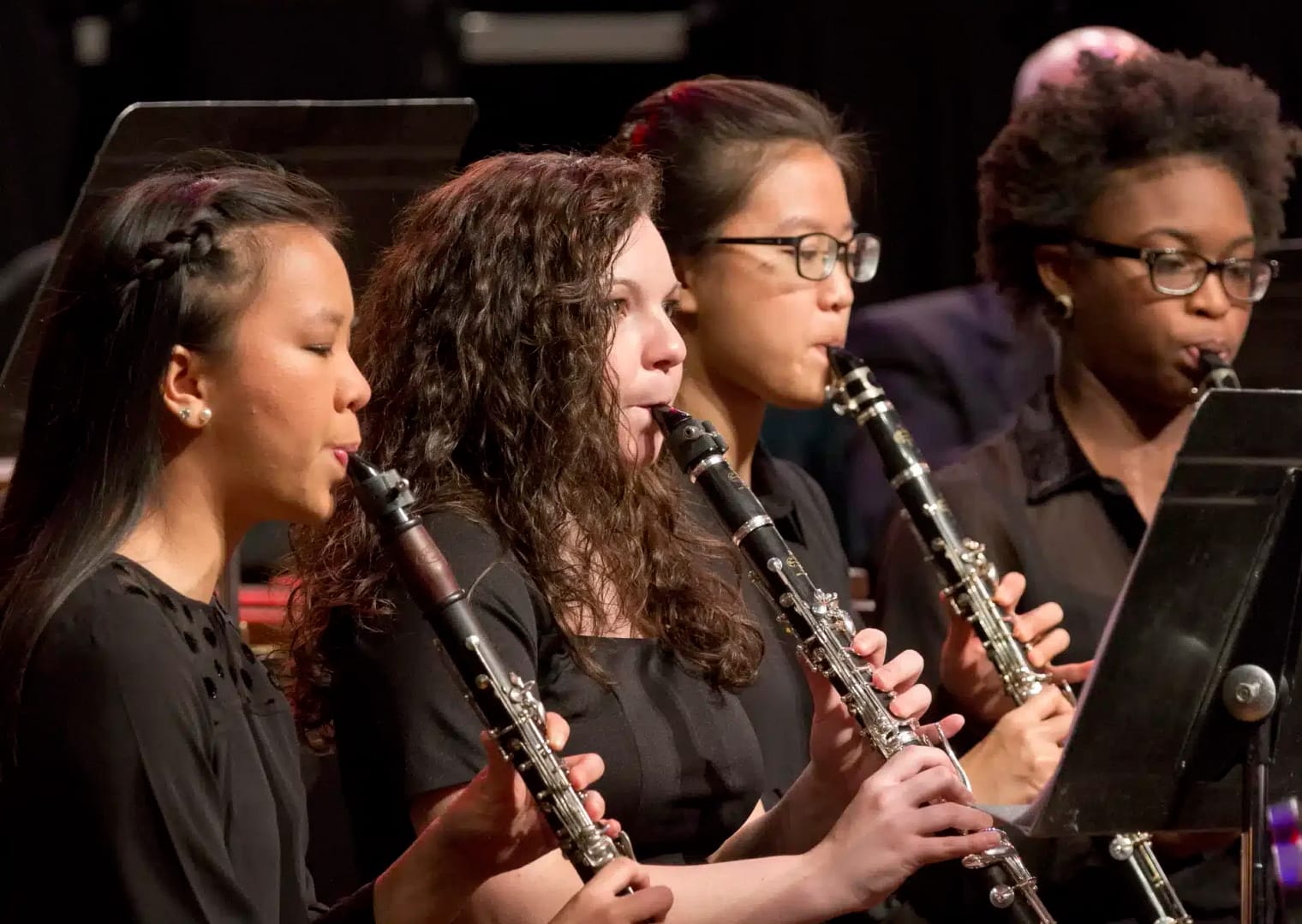 Students playing music at a concert