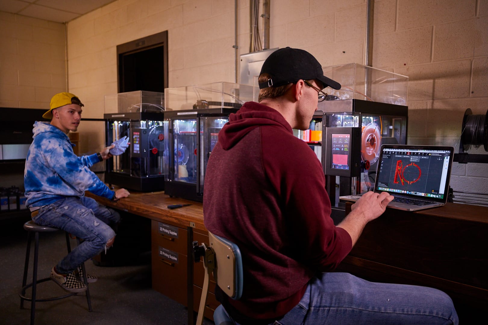 Two students working at computers