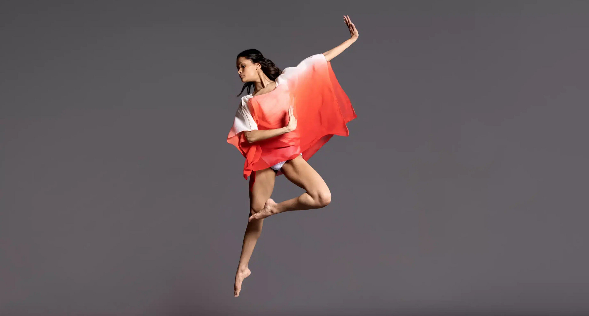 A dancer leaping in the air